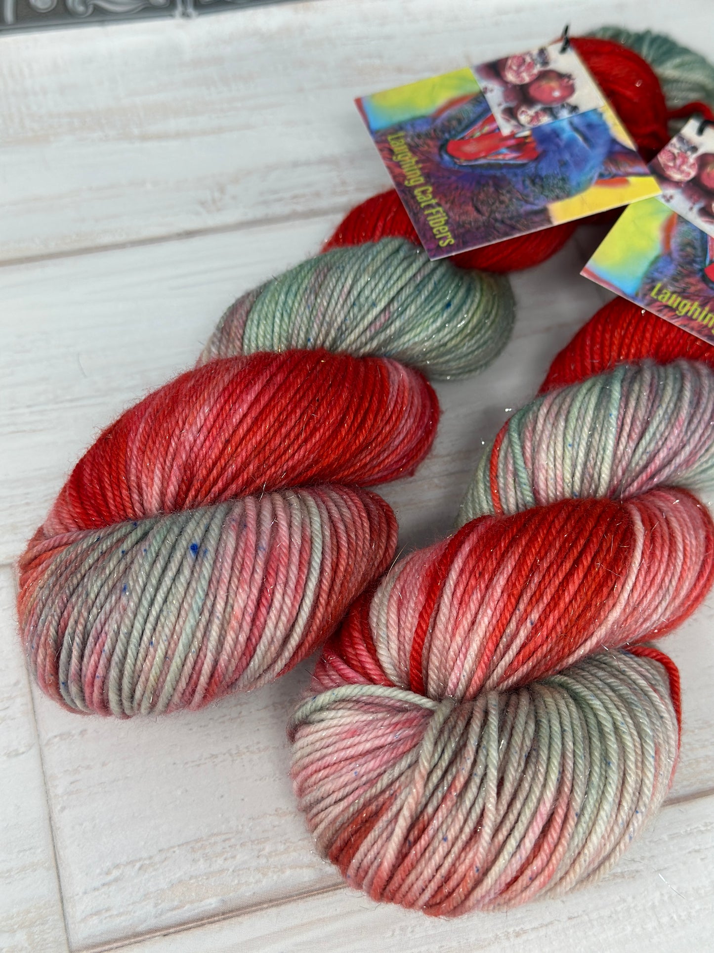 "Still Life: Bird & Pomegranate" on Various Yarn Bases