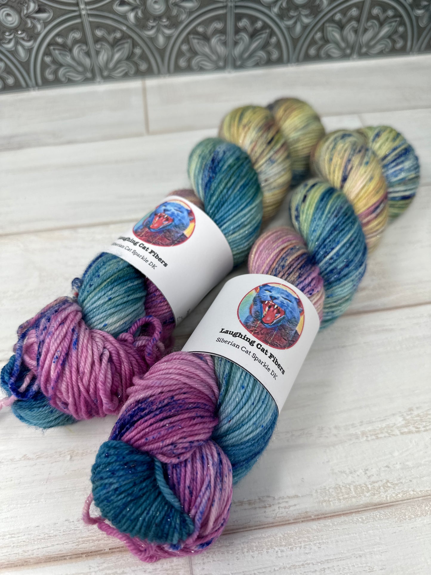 "Let Them Eat Cake" on Various Yarn Bases