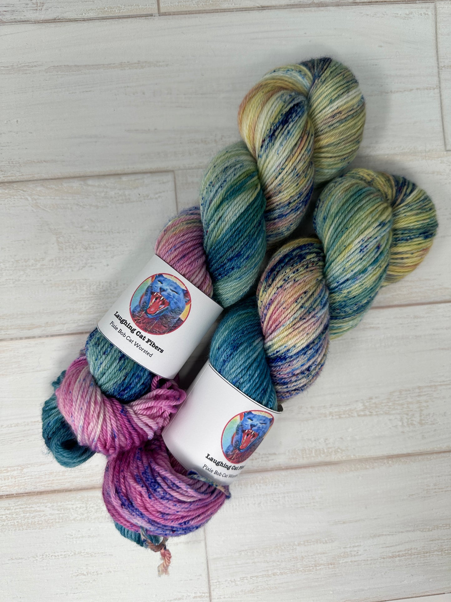 "Let Them Eat Cake" on Various Yarn Bases