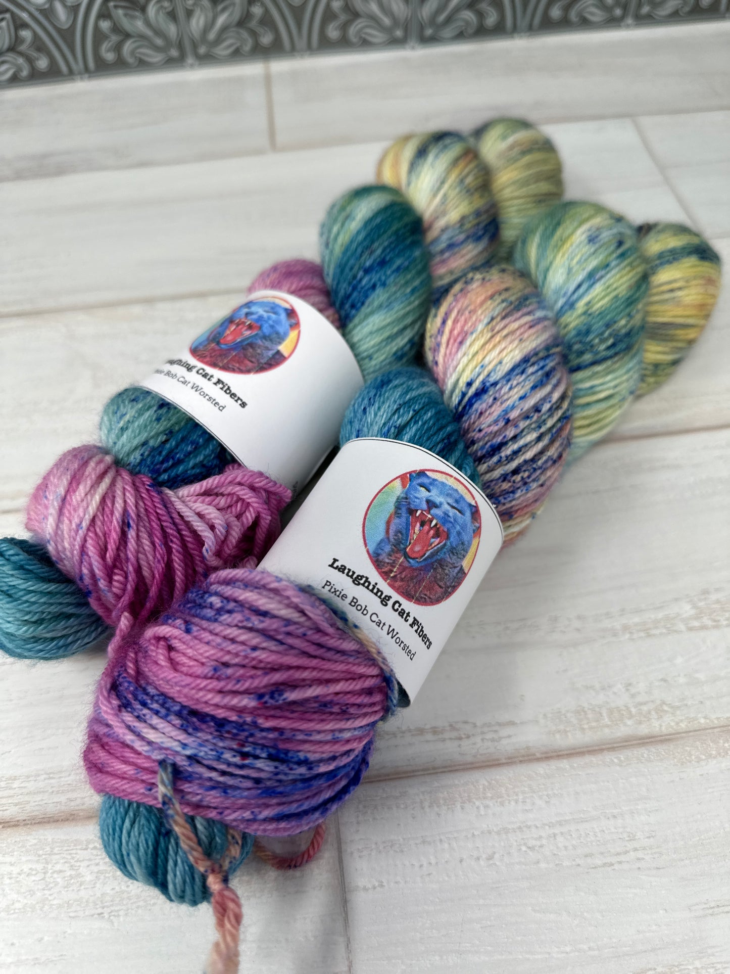 "Let Them Eat Cake" on Various Yarn Bases