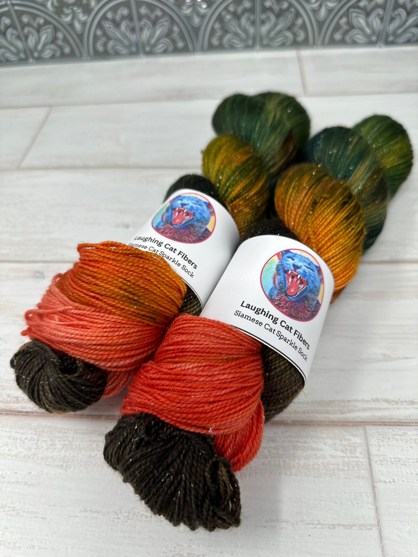 "The Cascades" on Various Yarn Bases