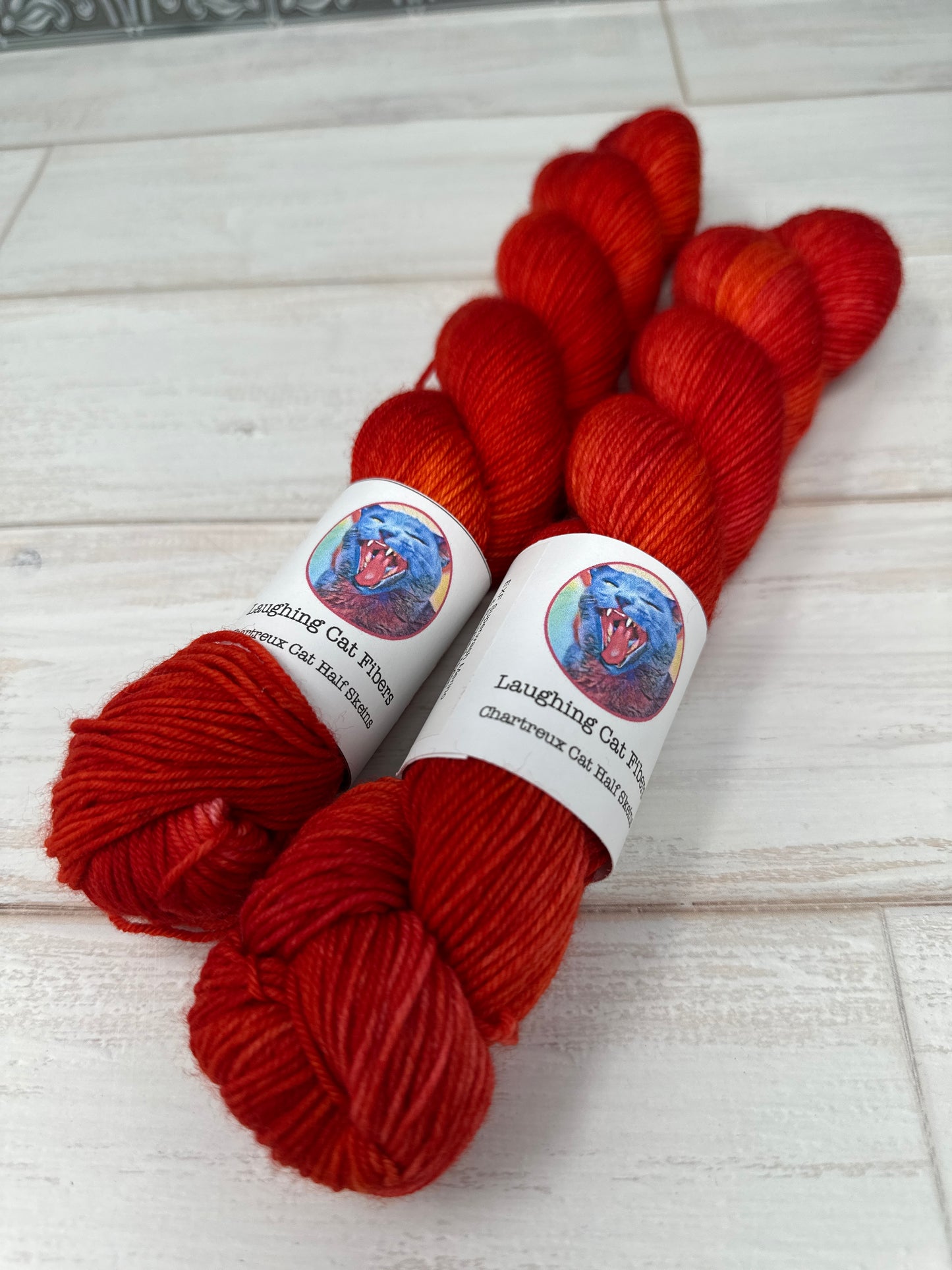 "Cayenne Pepper" on Various Yarn Bases