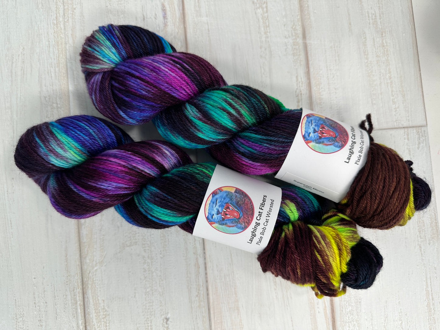"A Swiftly Tilting Planet" on Various Yarn Bases