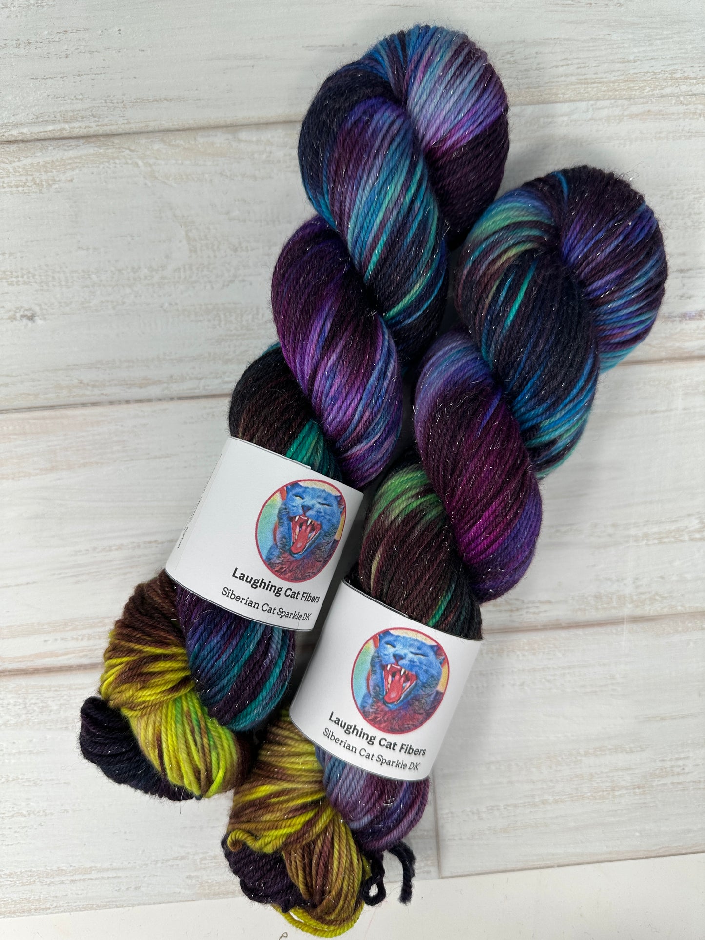 "A Swiftly Tilting Planet" on Various Yarn Bases