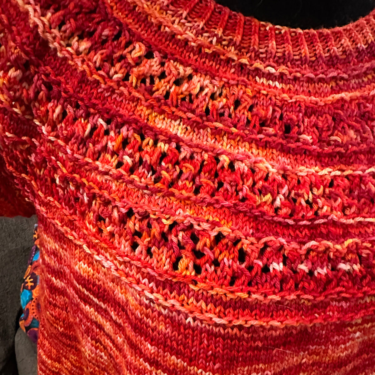 Close-up of a textured orange fabric with a wavy pattern