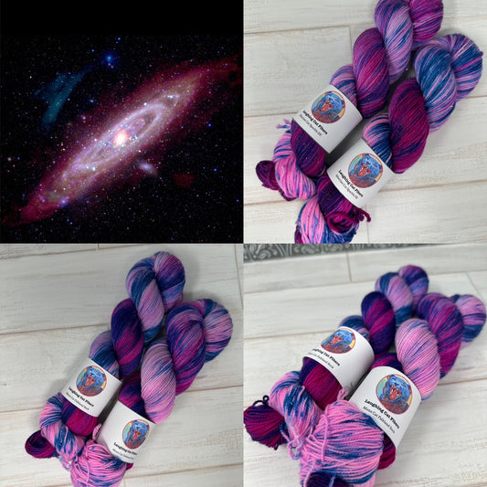 Collage of yarn skeins with galaxy-themed labels and a space image.