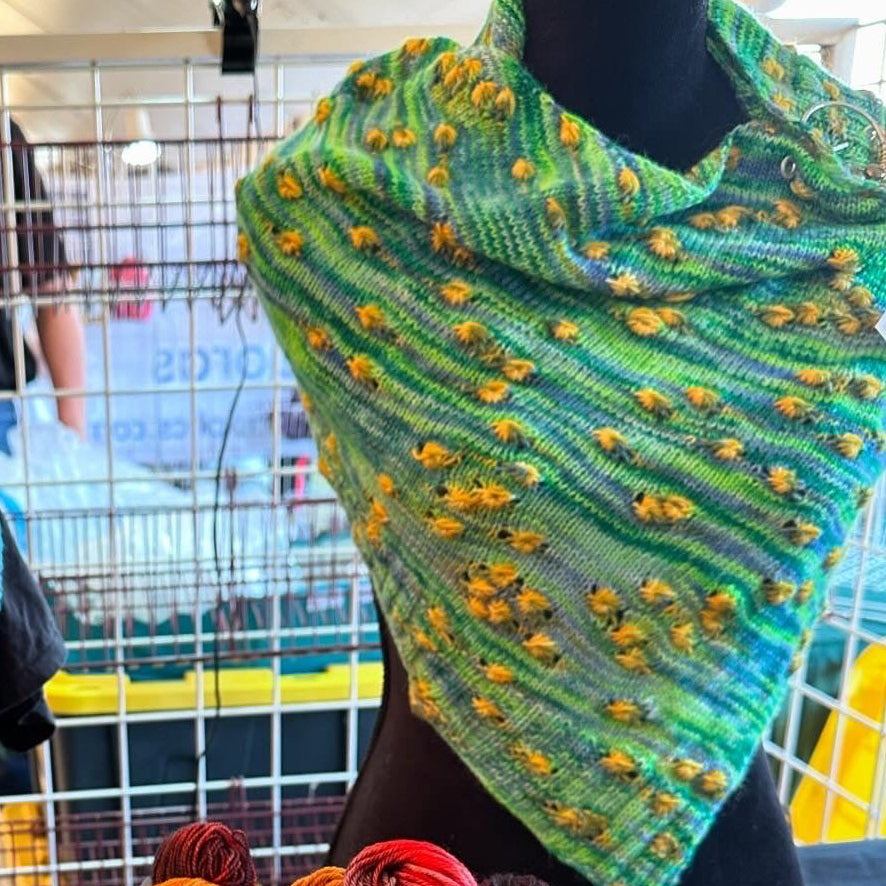 image of a green shawl with yellow clusters 