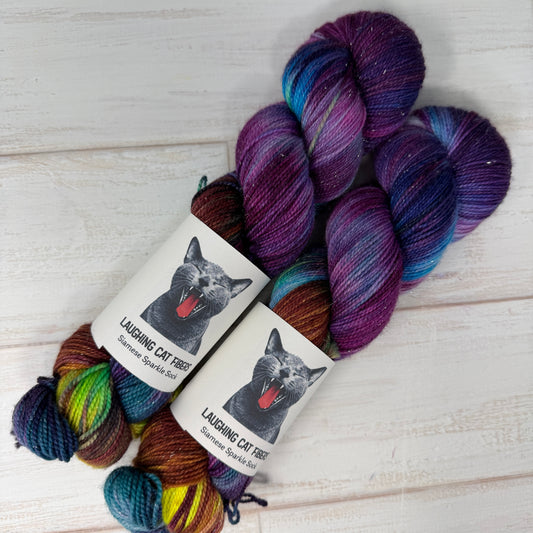 "A Swiftly Tilting Planet" on Various Yarn Bases