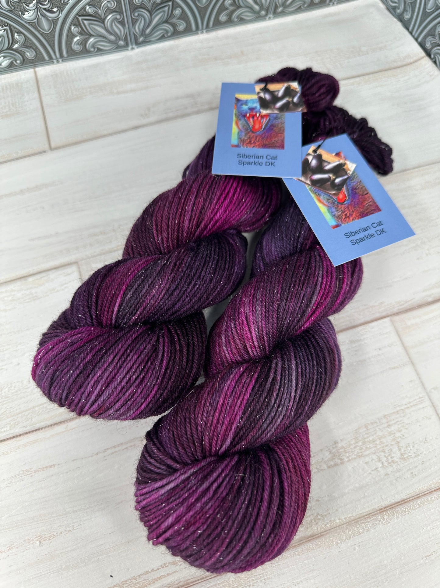 "Eggplant" on Various Yarn Bases