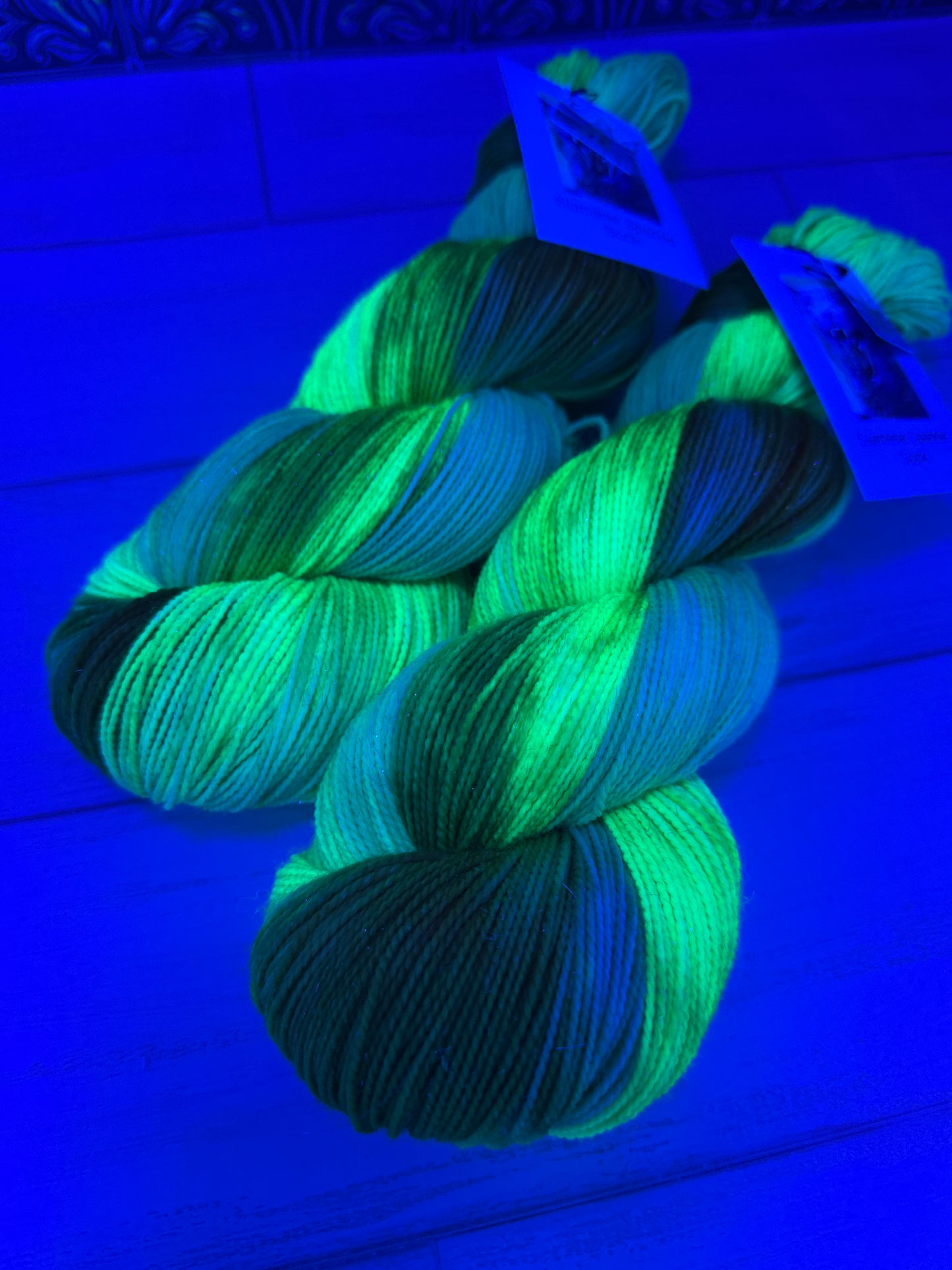 "Emerald City" on Various Yarn Bases