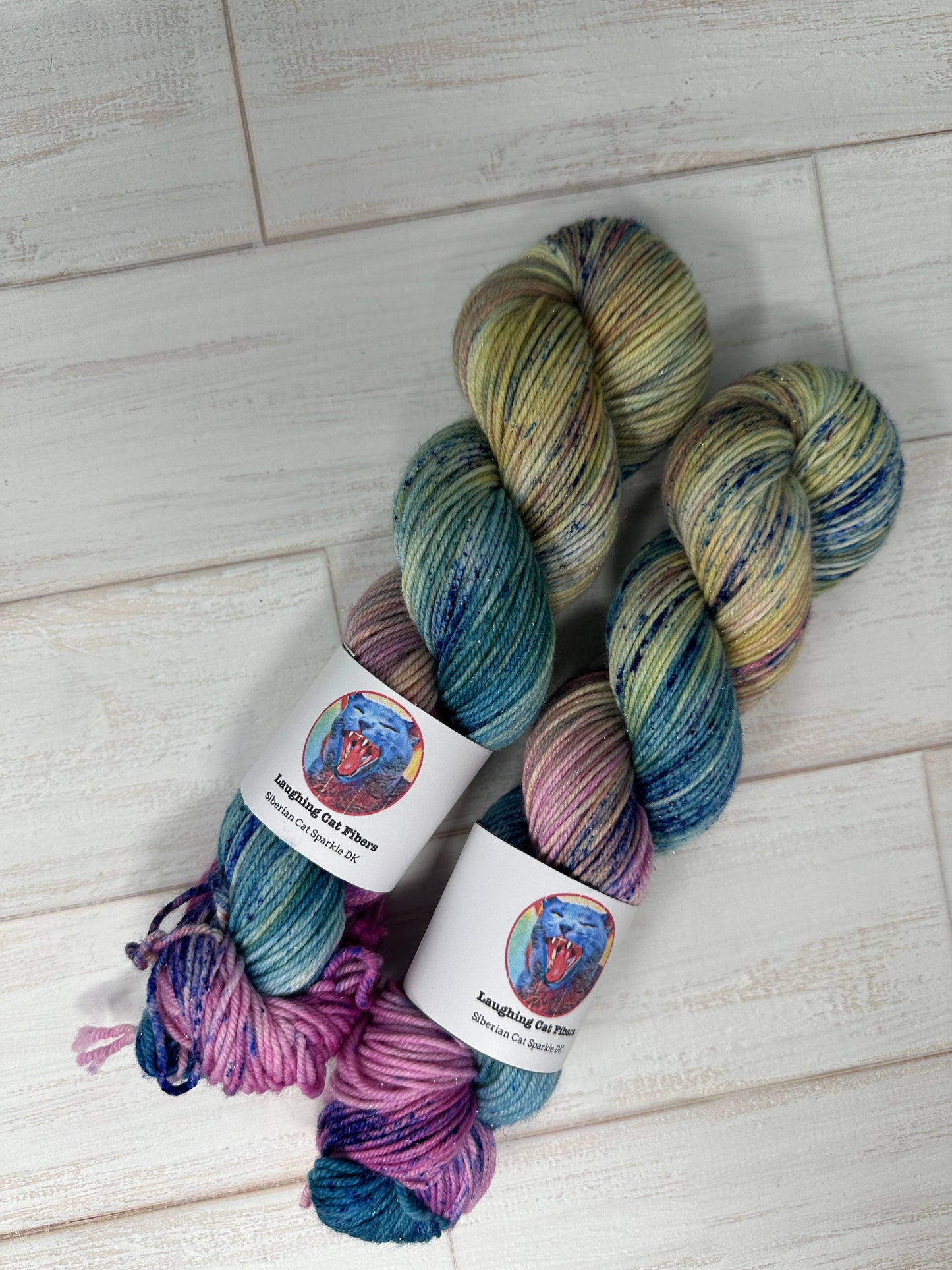 "Let Them Eat Cake" on Various Yarn Bases