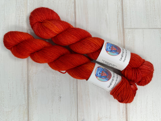 "Cayenne Pepper" on Various Yarn Bases