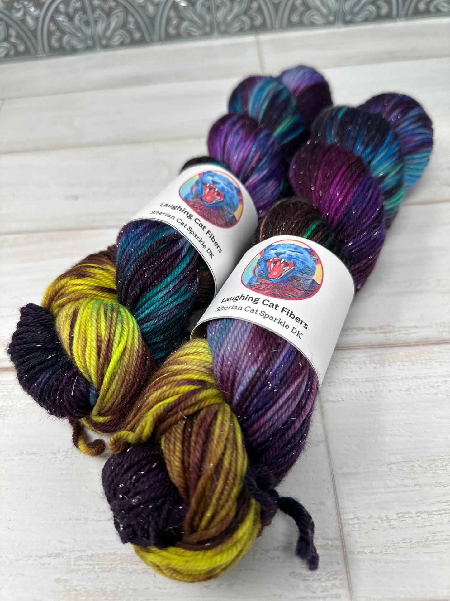 "A Swiftly Tilting Planet" on Various Yarn Bases