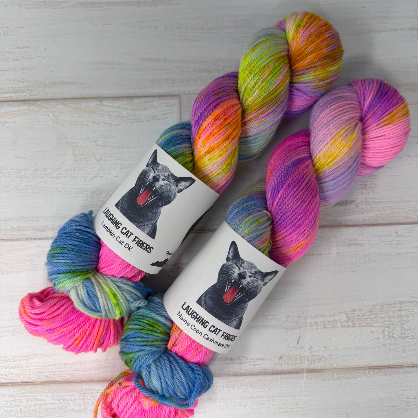 Colorful skein of yarn with a label on a wooden surface