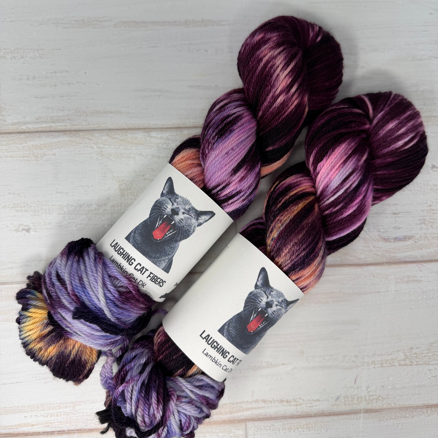 close up of two skeins of hand dyed yarn