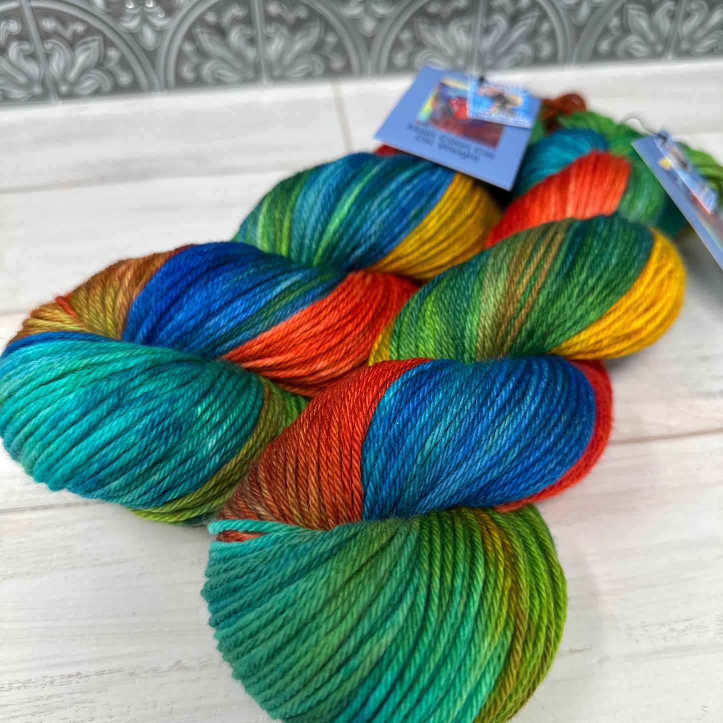 Multicolored skein of yarn on a textured surface
