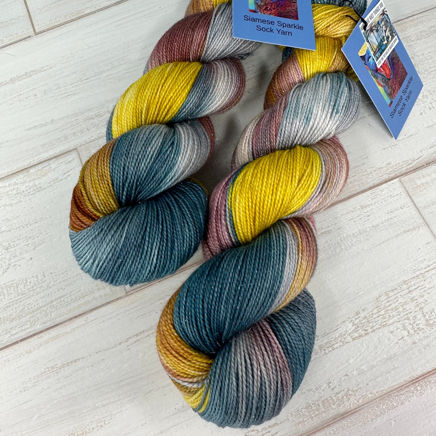 Multicolored skeins of yarn dyed by Laughing Cat Fibers Where the Wild Things Are