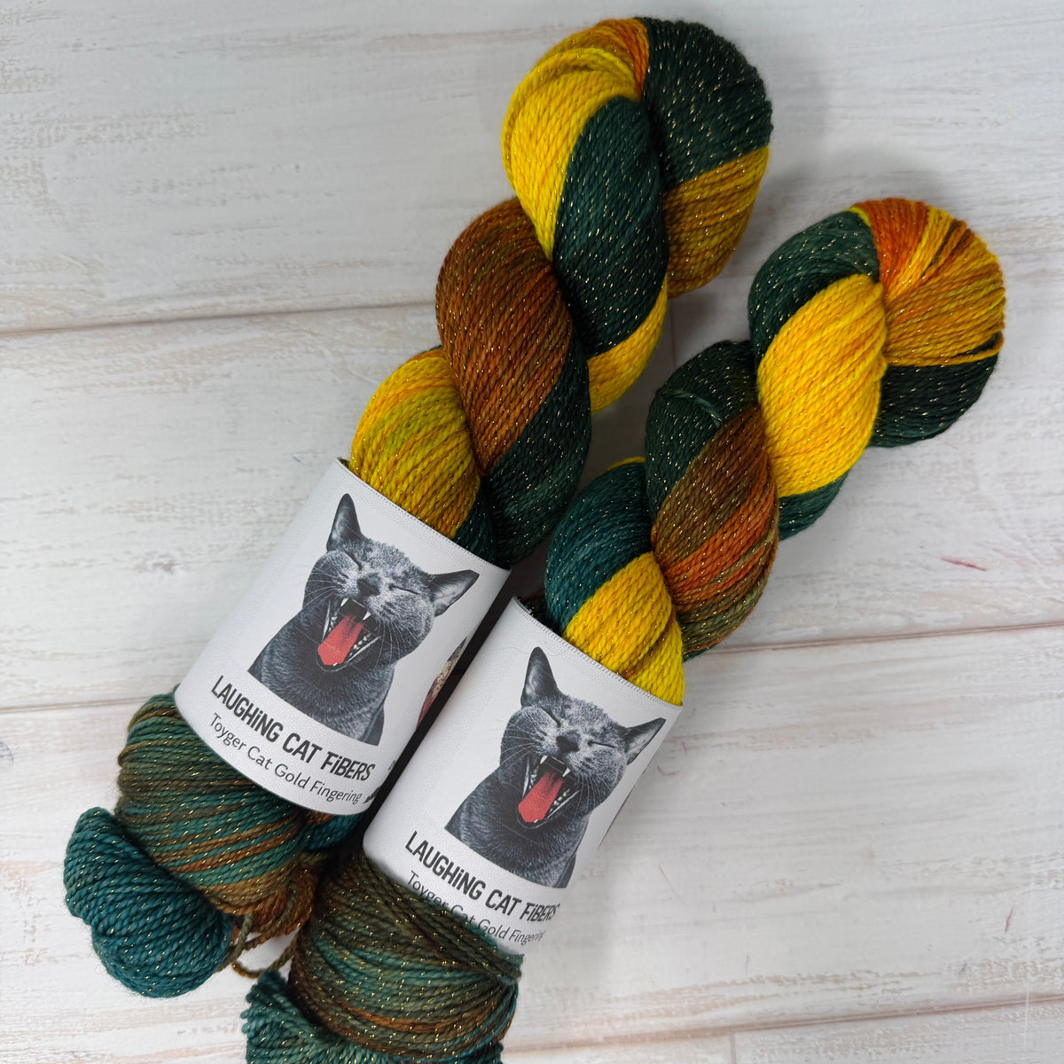 Laughing Cat Fibers Toyger Gold base in the Goldfish colorway 