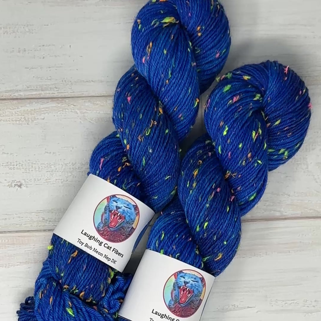 video clip of neon speckled yarn in normal light