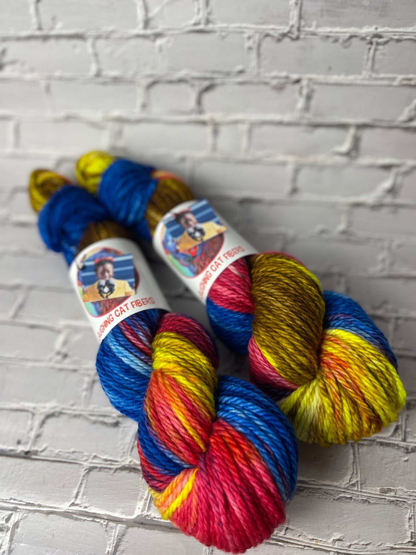 "The Hill We Climb" on Various Yarn Bases
